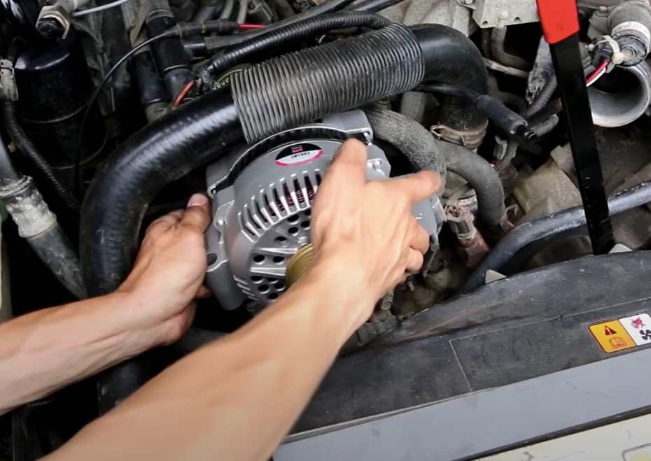 Electrical system repairs like this alternator replacement in Santa Ana, California, by Santa Ana Mobile Mechanic technician.