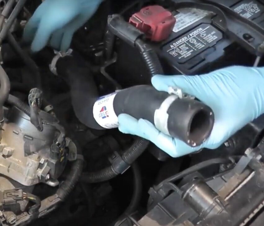 Auto cooling system repairs include replacing leaking radiator hoses for Santa Ana, CA, motorist.